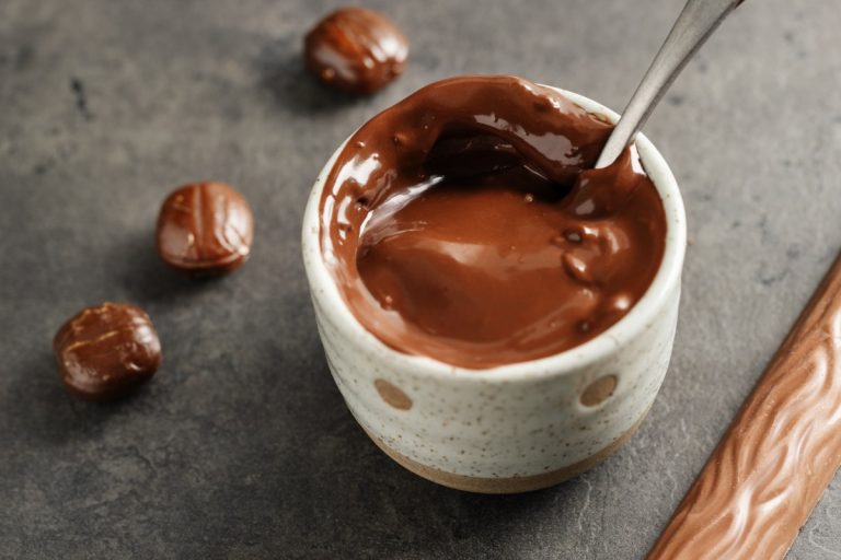melted-chocolate-cup-grey-background-closeup (1)
